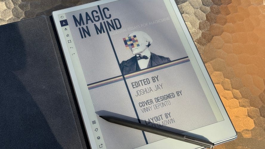 A color e-ink tablet by ReMarkable, with a stylus lying on top