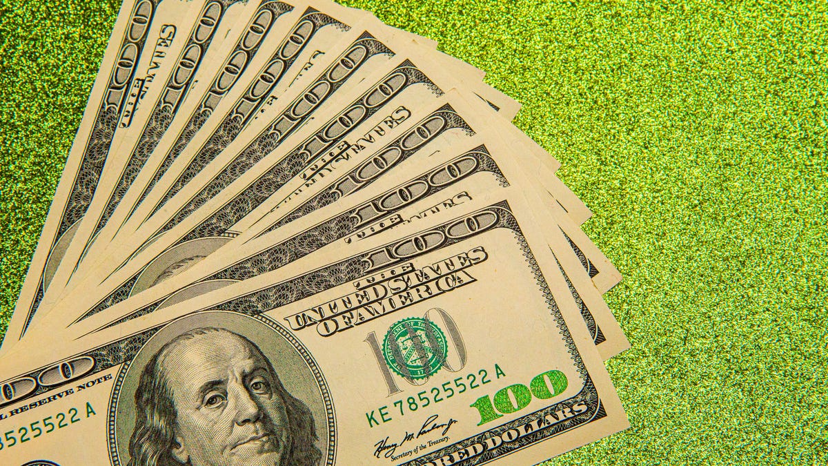 $100 bills fanned out.