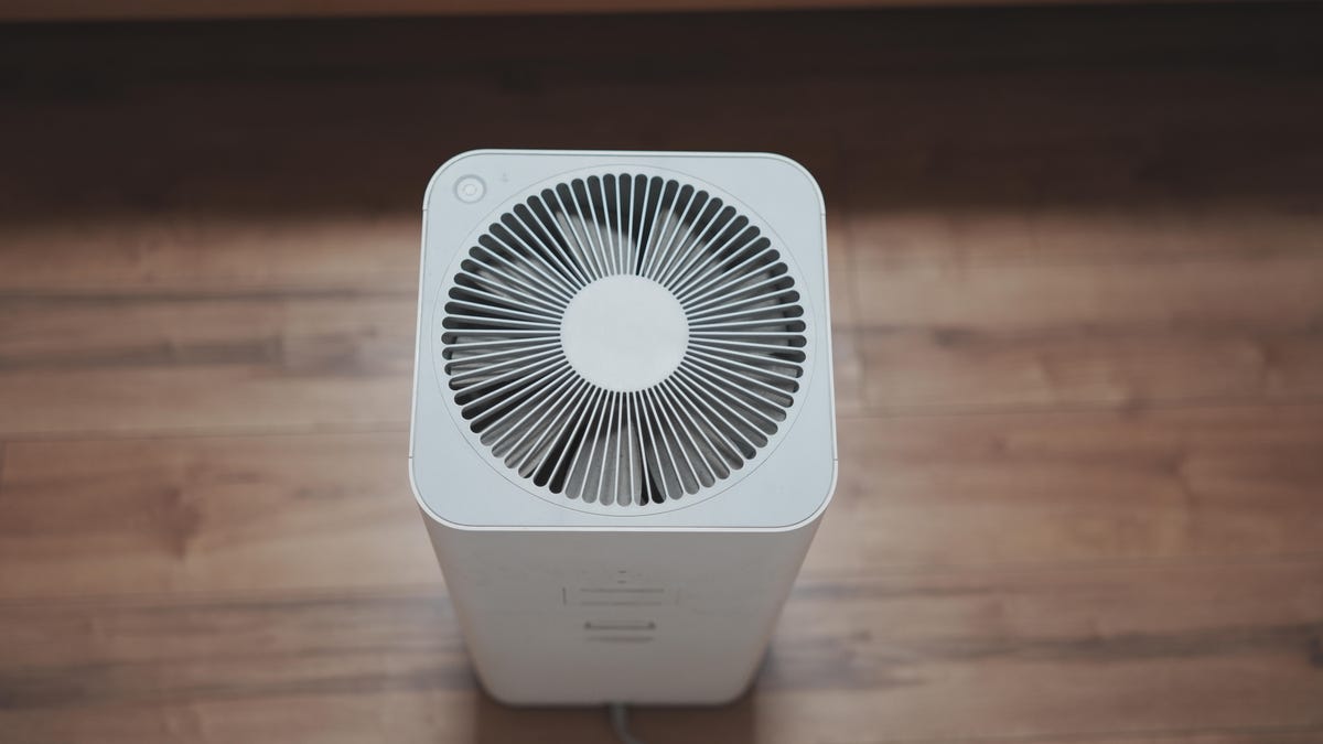 air purifier on a wood floor