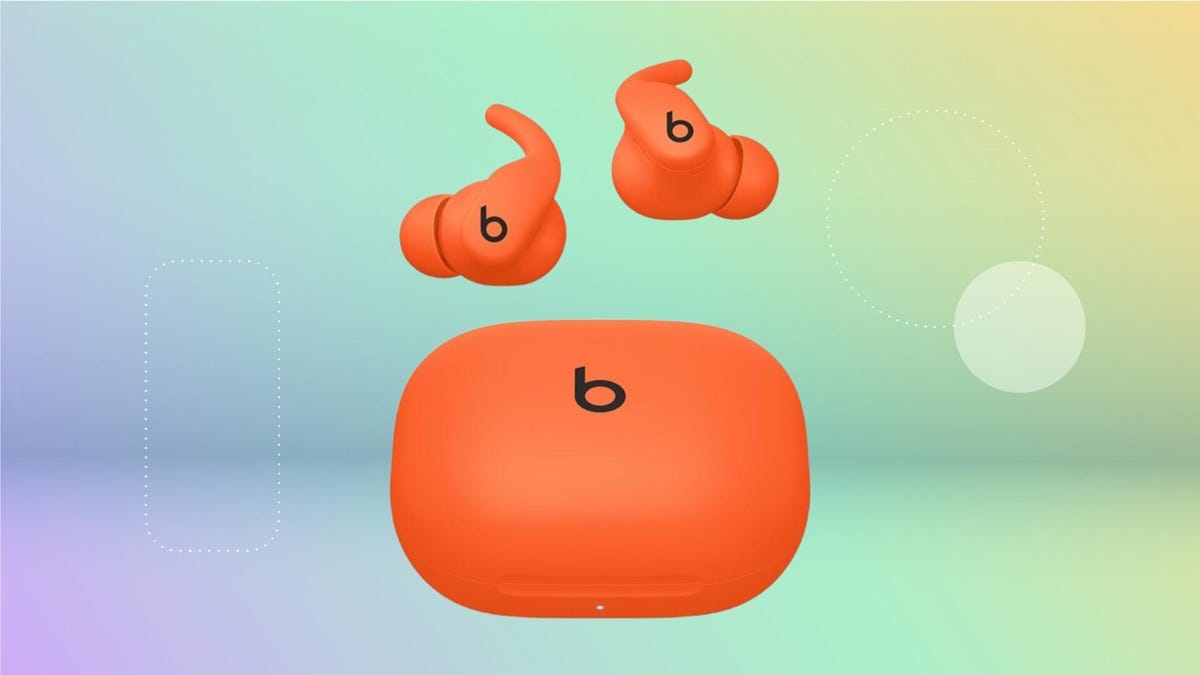 Beats Powerbeats Fit earbuds in orange