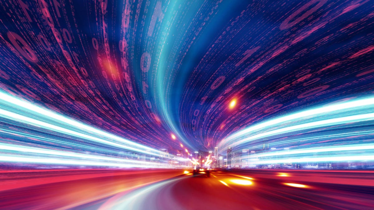 Slightly abstract image of blurred streaks of light symbolizing speed.