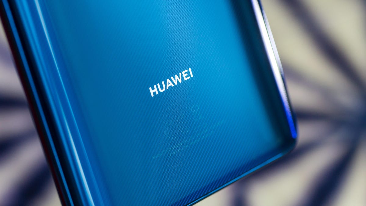 Huawei logo on the back of a mobile phone.