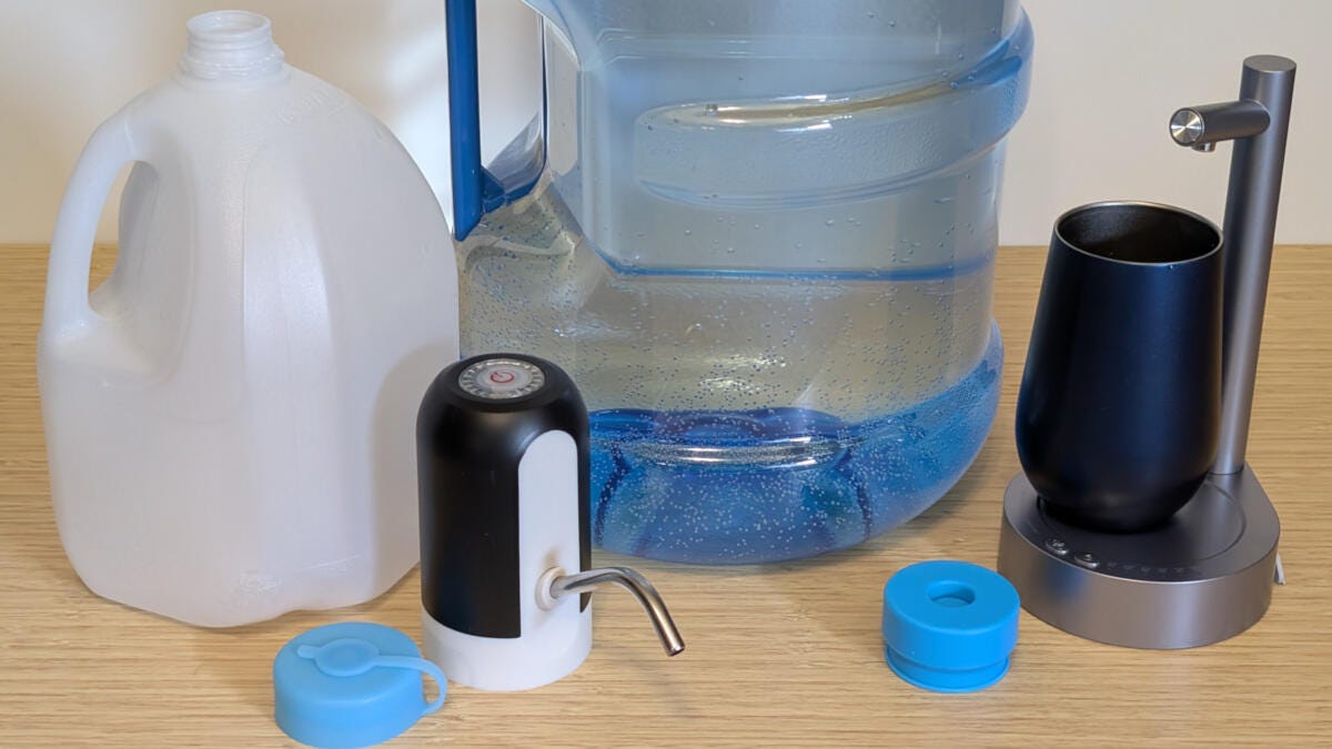 my vision and keweis water dispensers on bamboo desk with silicone jug