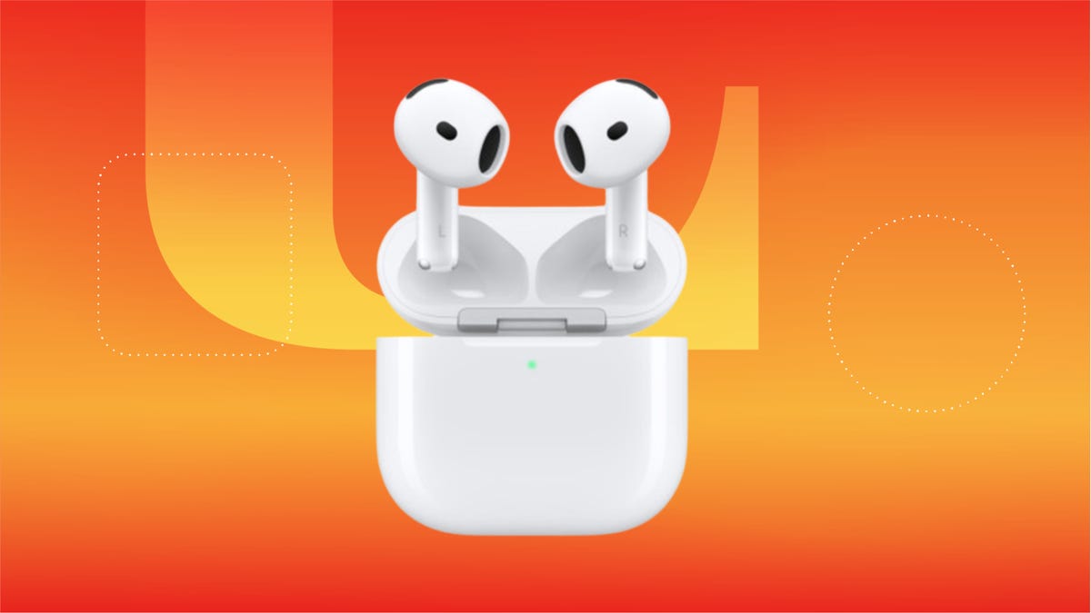 White AirPods and case against orange gradient background.