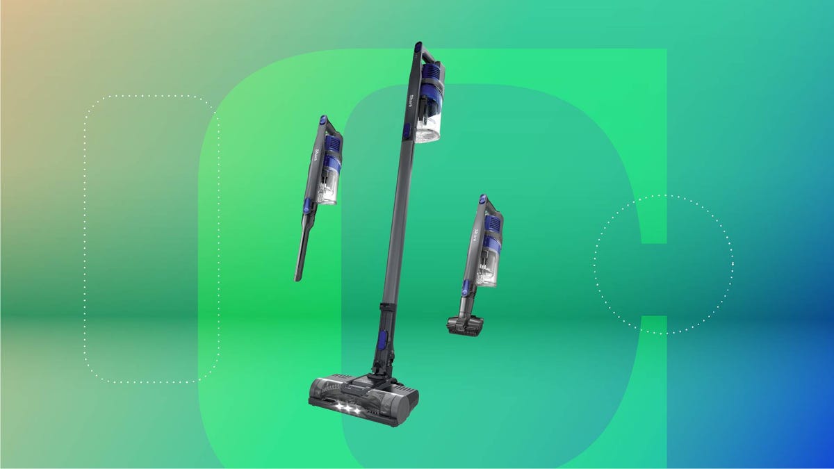 A cordless vacuum against a green gradient CNET background.