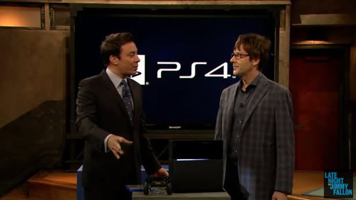 Jimmy Fallon (left) and Mark Cerny check out the PS4.