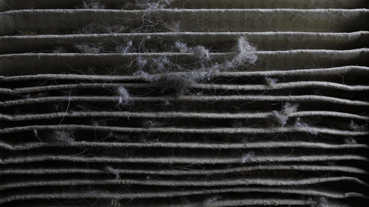 A gray, dirty furnace filter.
