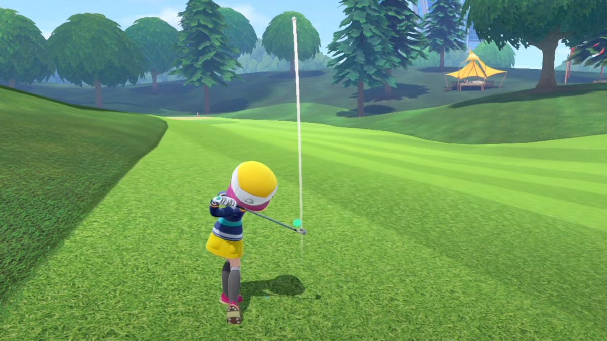 a character with a yellow hat hits a golf ball down a fairway in a screenshot from Nintendo Switch Sports