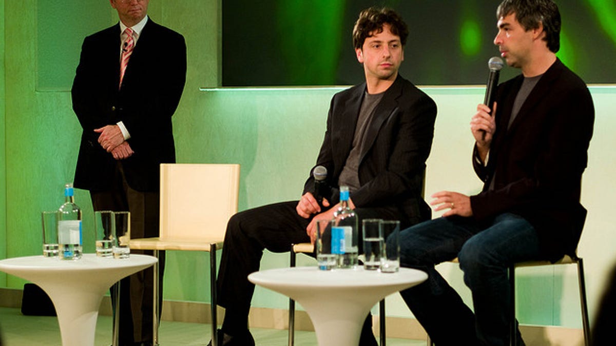 Google's Larry Page (right) has his work cut out for him now that Google's ruling trio of Eric Schmidt (left) and Sergey Brin has changed.