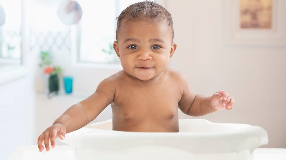 Baby in a portable bath