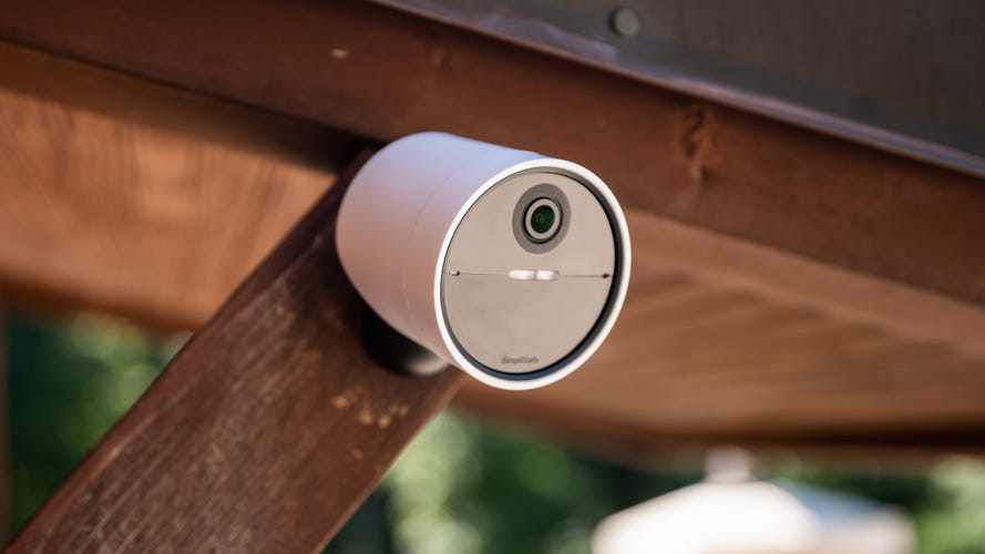 SimpliSafe camera mounted outdoors.