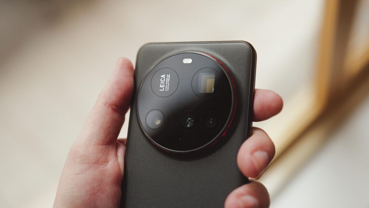 A hand holding the Xiaomi 15 Ultra