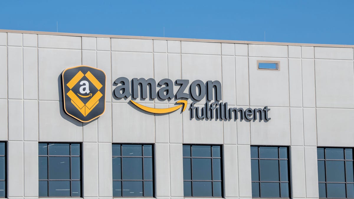 The outside of a warehouse with a sign saying "Amazon fulfillment."