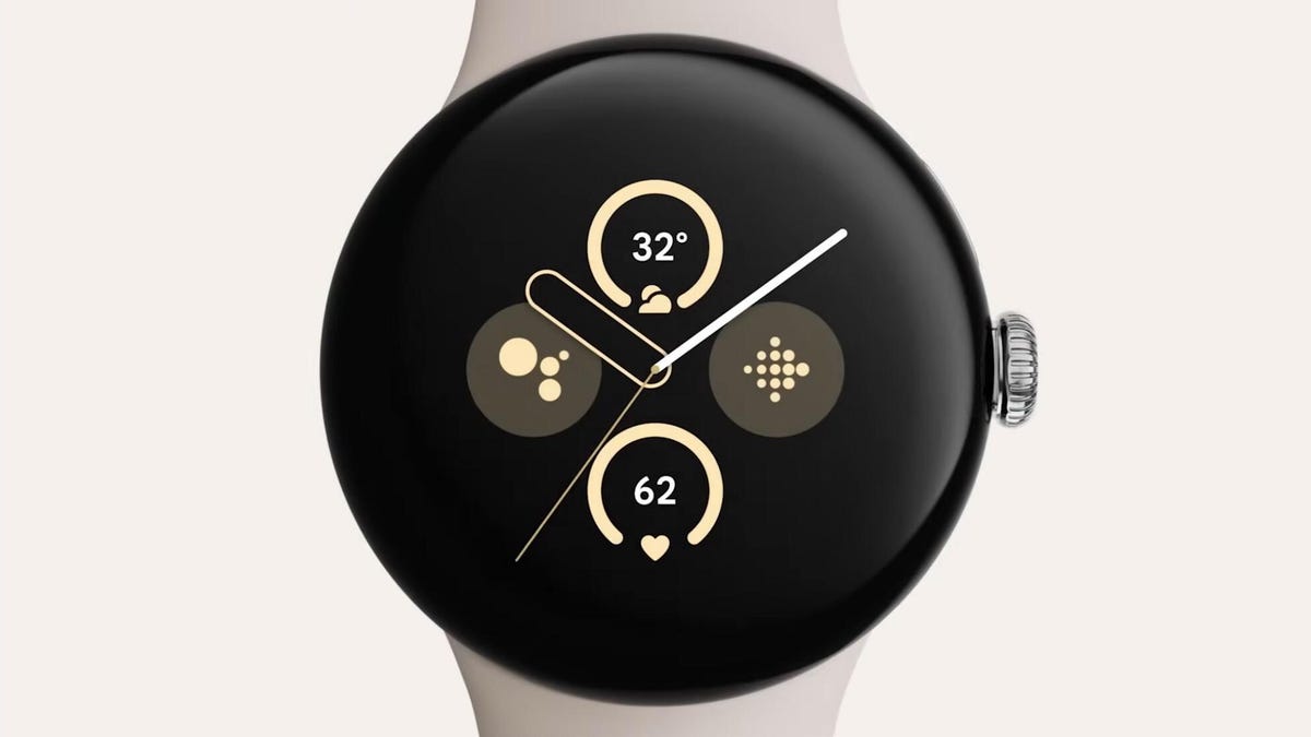A round smartwatch with a minimalist digital face showing a quartet of app icons under watch hands.