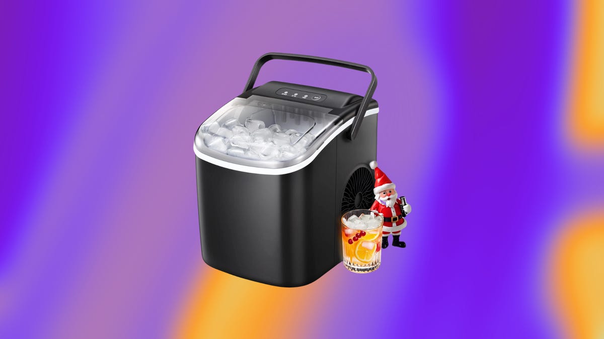 The Kissair countertop ice maker is displayed against a purple and orange background.