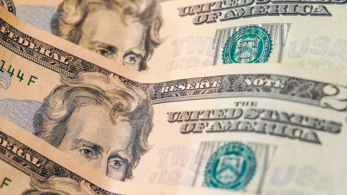 006-money-us-dollar-bills-roll-stack-cash