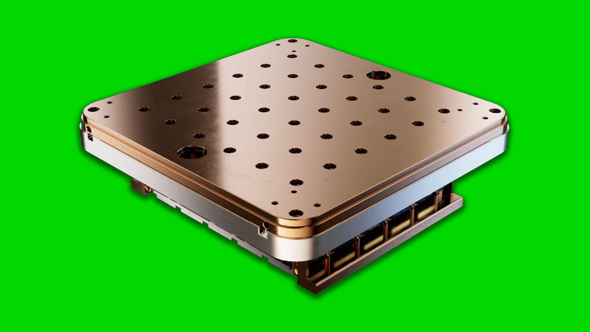 A thick package of processors sports a gleaming copper top to carry away waste heat
