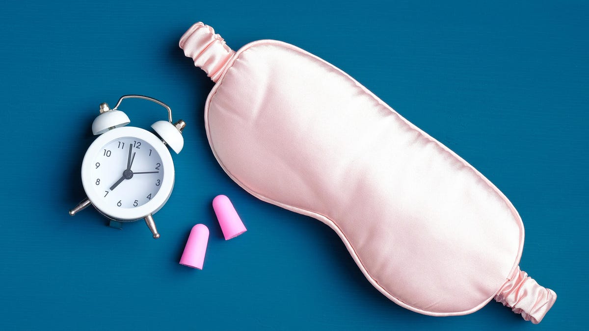 Eye mask and alarm clock