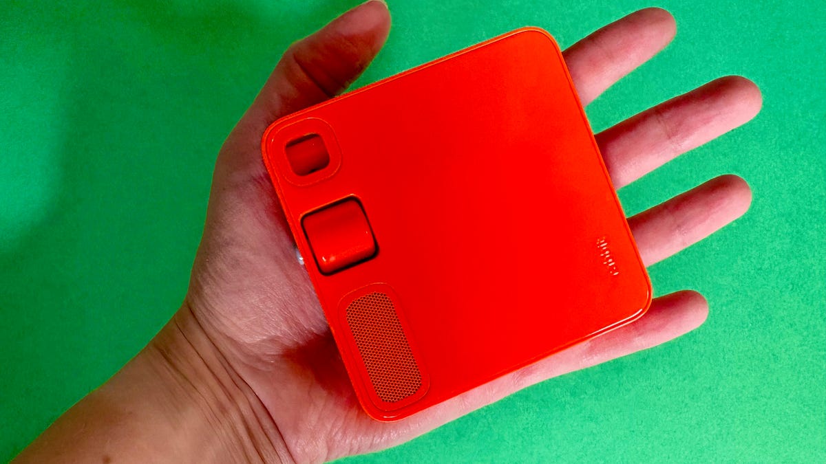 The Rabbit R1 in someone's hand