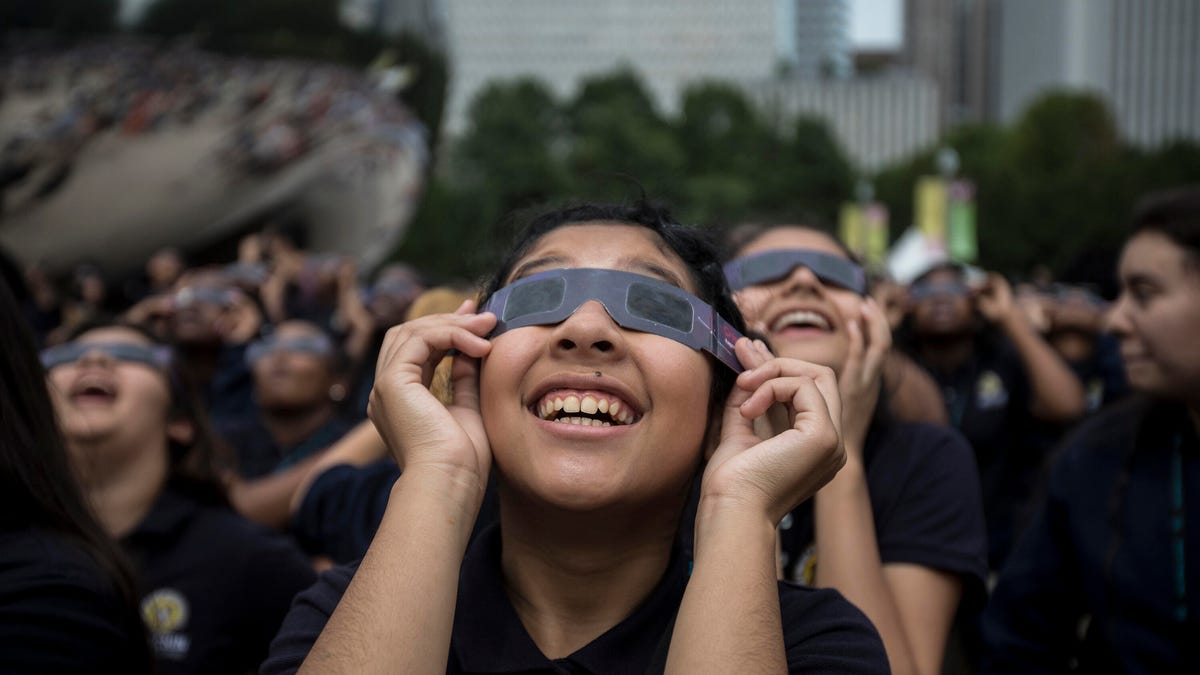 students watching a solar eclipse
