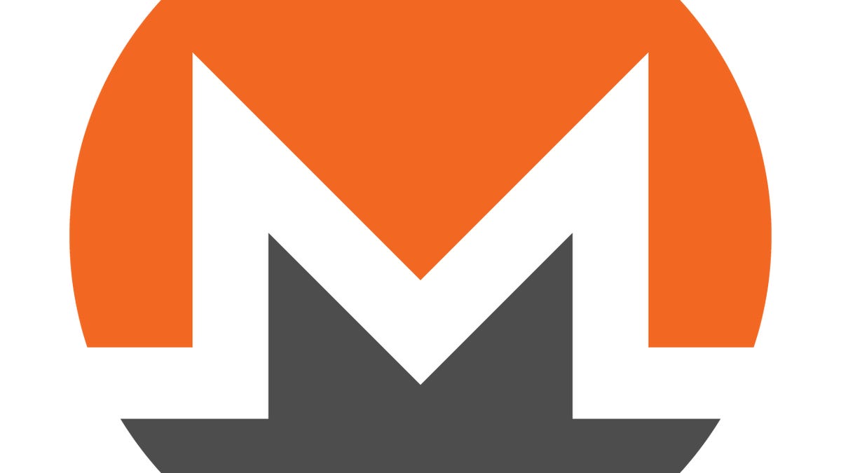The Monero symbol -- a white, angular letter em in a circle that is orange above the em and gray below. Using a script called Coinhive, a website for fans of deepfake videos mined cryptocurrency Monero on visitors' computers, researchers found.
