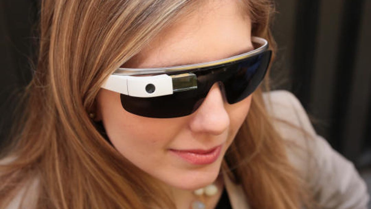 CNET's Bridget Carey tries on Google Glass with the sunglass attachment on, because the world is just too bright.