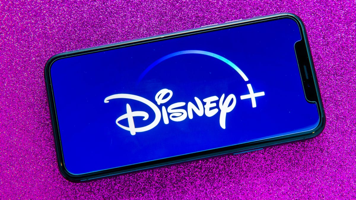 015-disney-disney-plus-logo-on-phone-and-ipad-cnet-2021