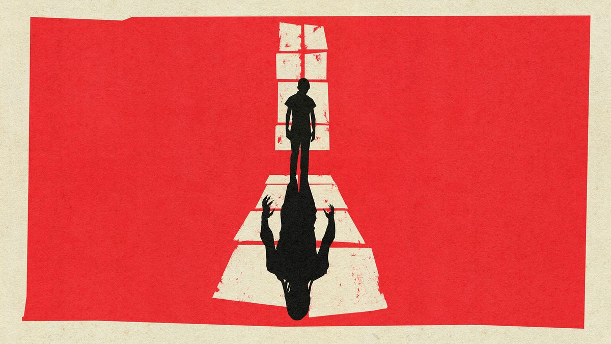 A person stands in front of a window, casting a monstrous shadow in Stranger Things: The First Shadow