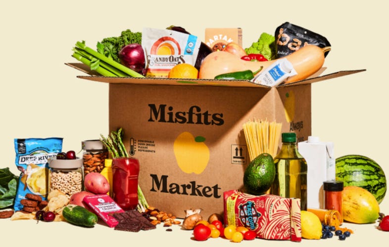 Box with groceries spilling out