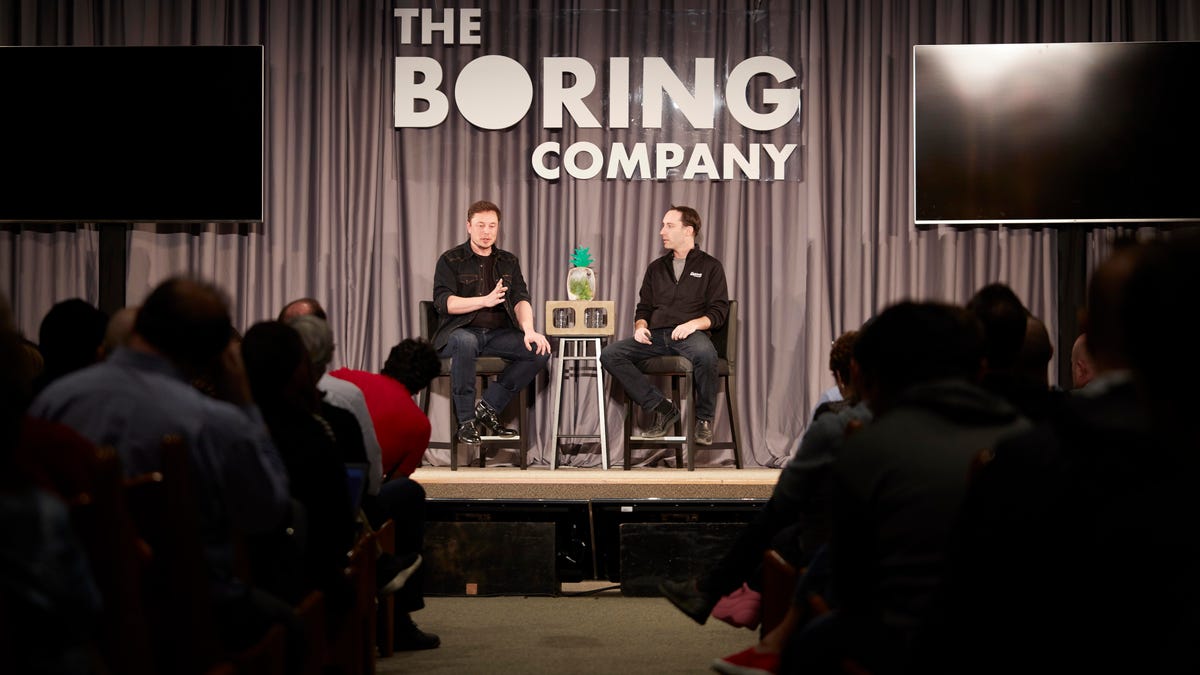 Boring Company founder Elon Musk and director Steve Davis speak at the Leo Baeck Temple in Los Angeles.