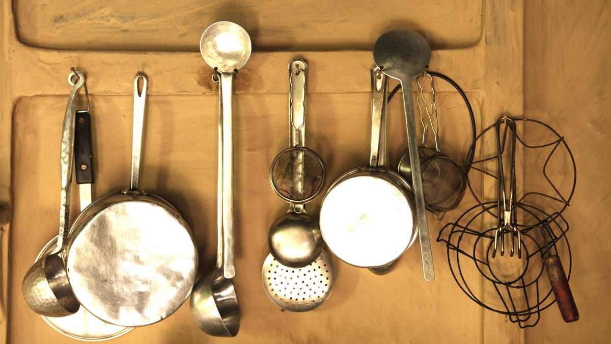 kitchen tools hanging on wall