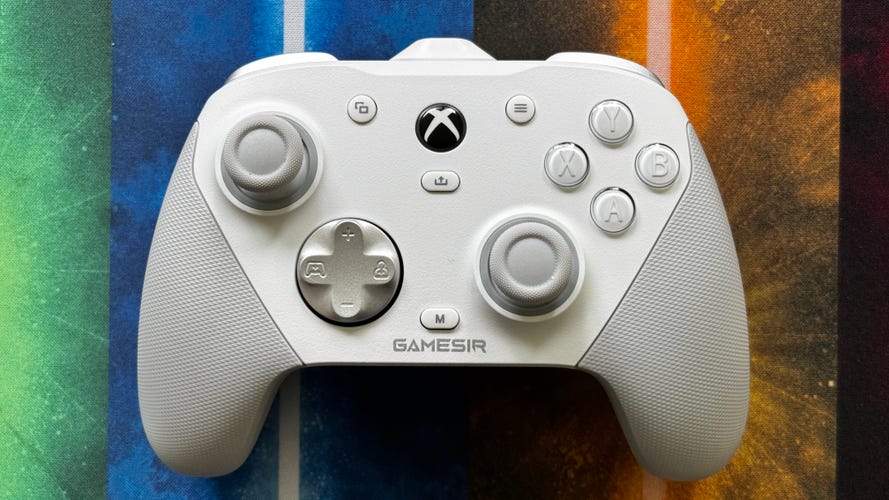 GameSir G7 Pro white controller on desk mat with colored lightsabers