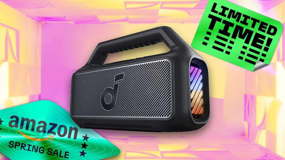 A black Soundcore Boom portable speaker with pink and yellow background and a limited-time sticker