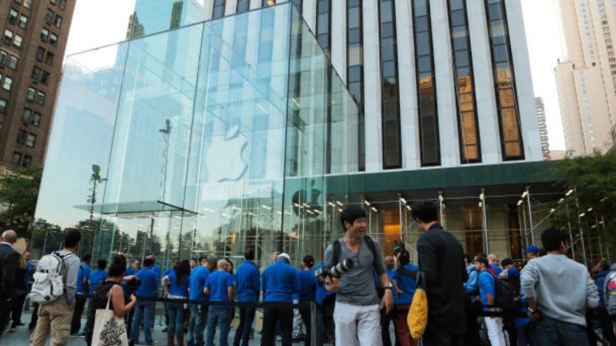 Hundreds of people await the iPhone 5S and 5C launch at Apple's Fifth Avenue store in Manhattan.