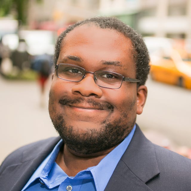 Headshot of Nigel Manuel