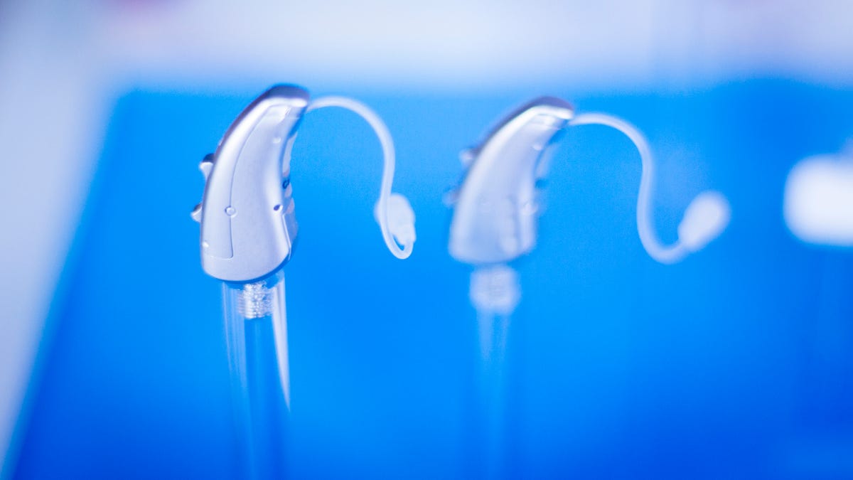 Digital hearing aids in retail store shop window.