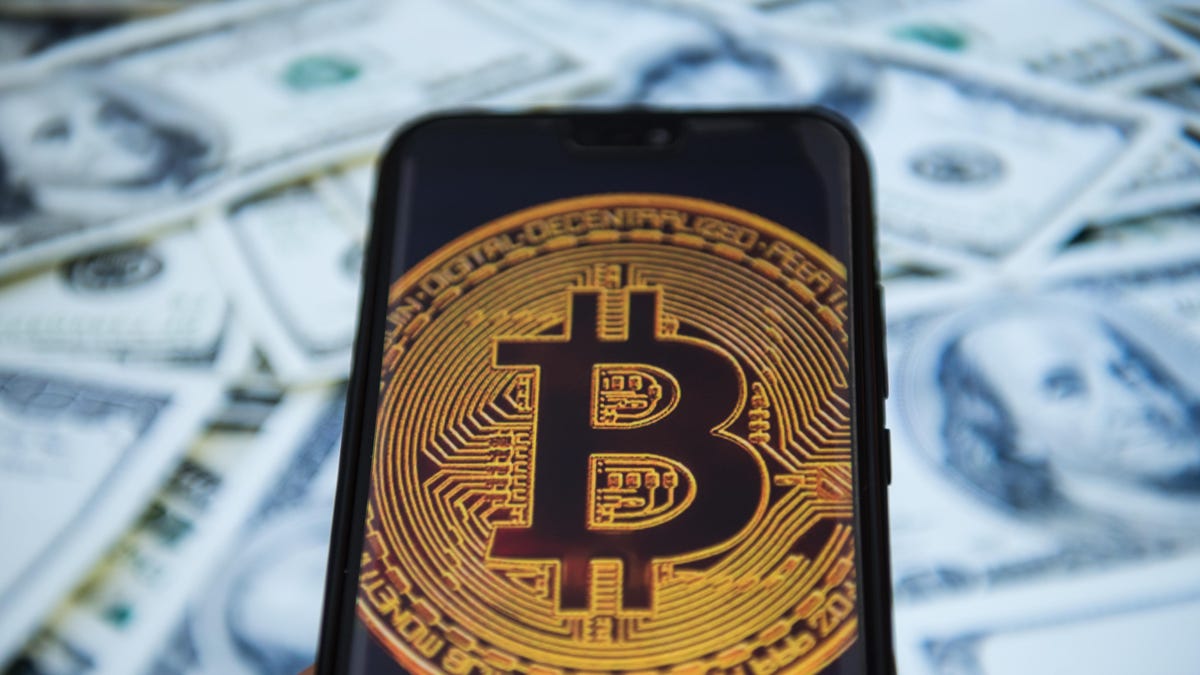 Bitcoin logo is seen on an android mobile phone