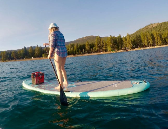 Aqua marina paddle board in the water