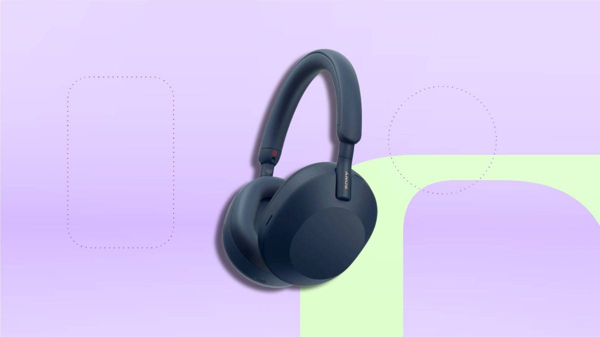 Blue Sony headphones on a gray background.