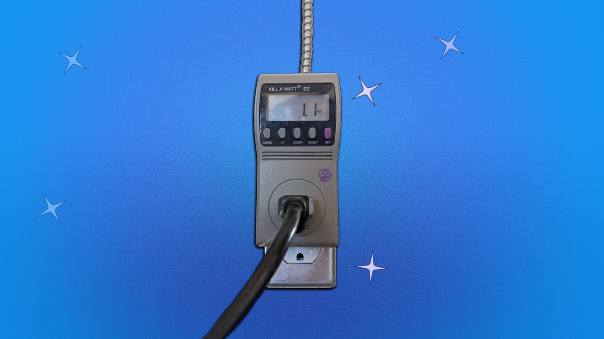 A cord plugged into a Kill A Watt meter against a blue background with sparkles