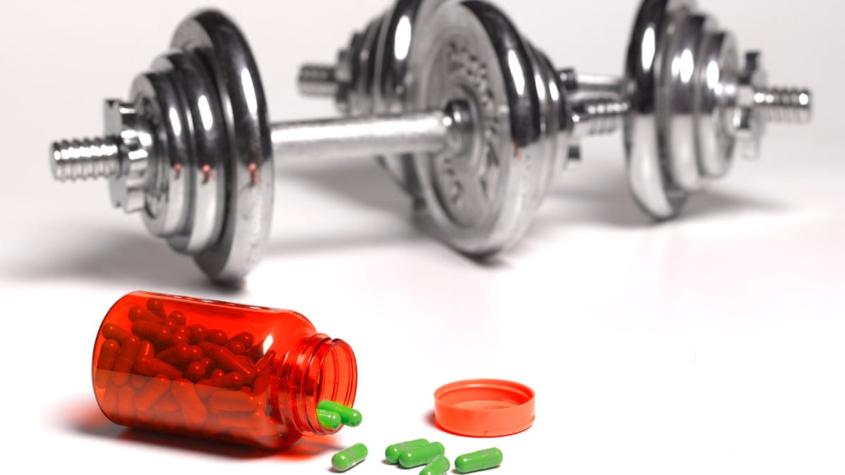 supplements and dumbbells