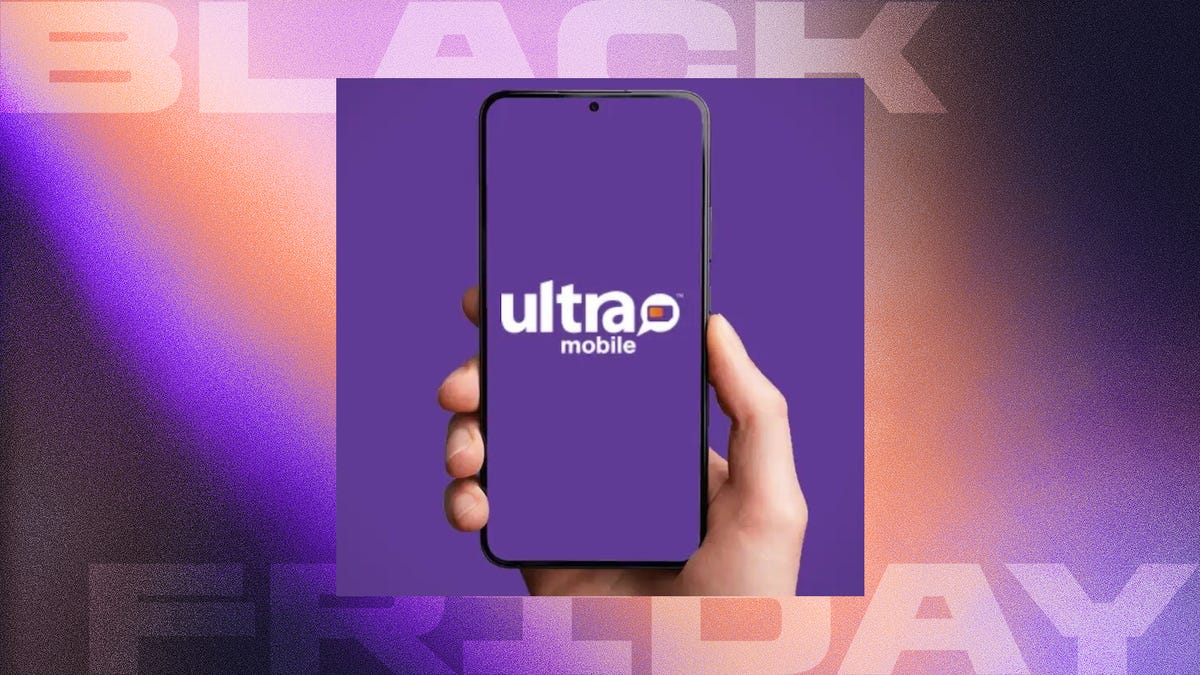 Hand holding a smartphone with purple Ultra Mobile logo against matching background.