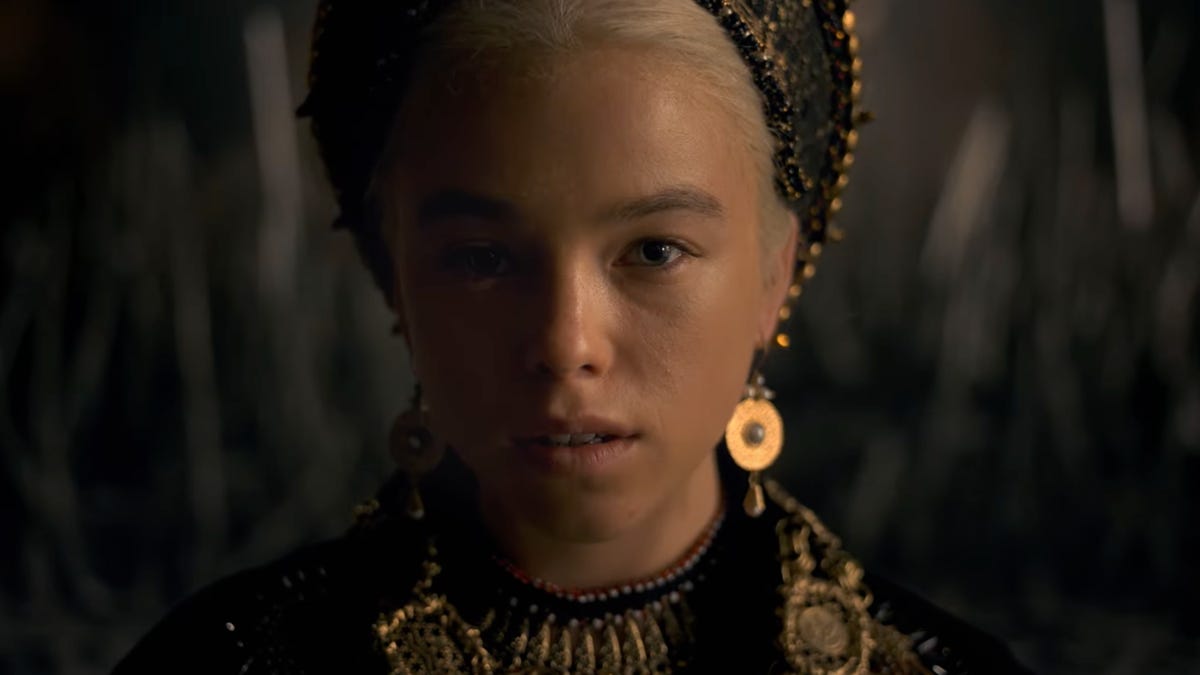 A closeup of Princess Rhaenyra Targaryen, staring directly into the camera