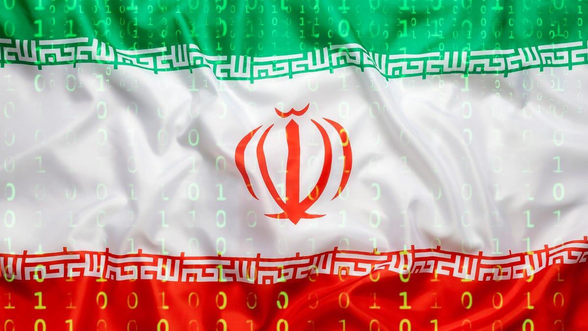 The Iranian flag with an overlay of computer code.