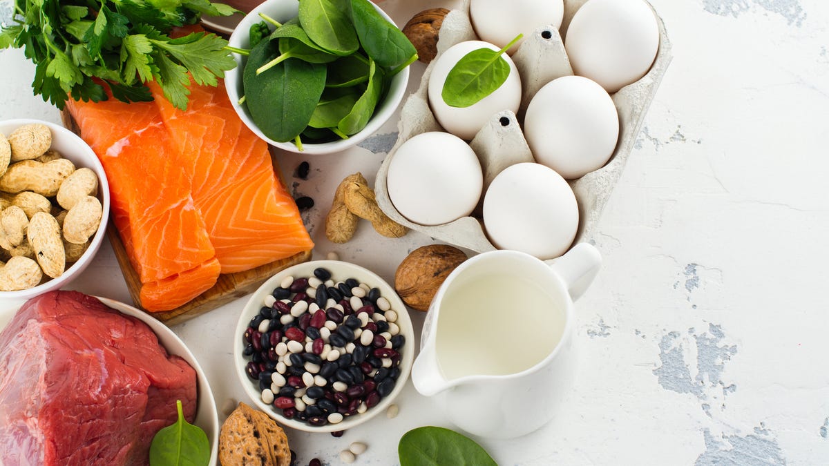 All foods for healthy hair such as eggs, salmon, eggs and spinach.