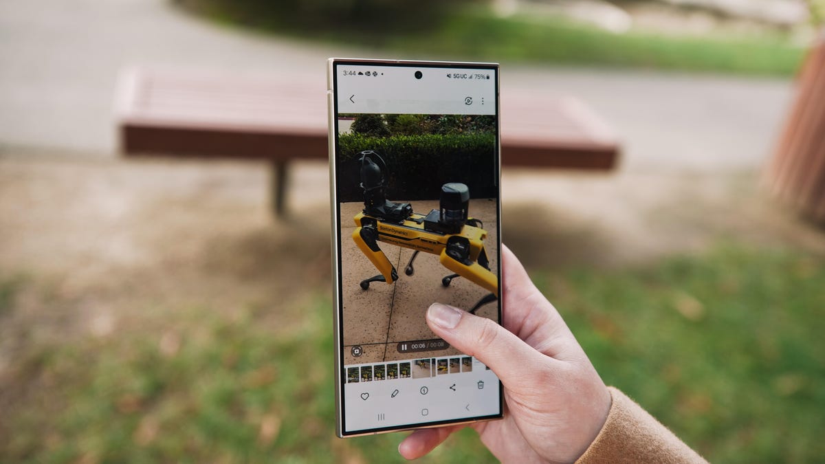 The Galaxy S24 Ultra showing a video in hand