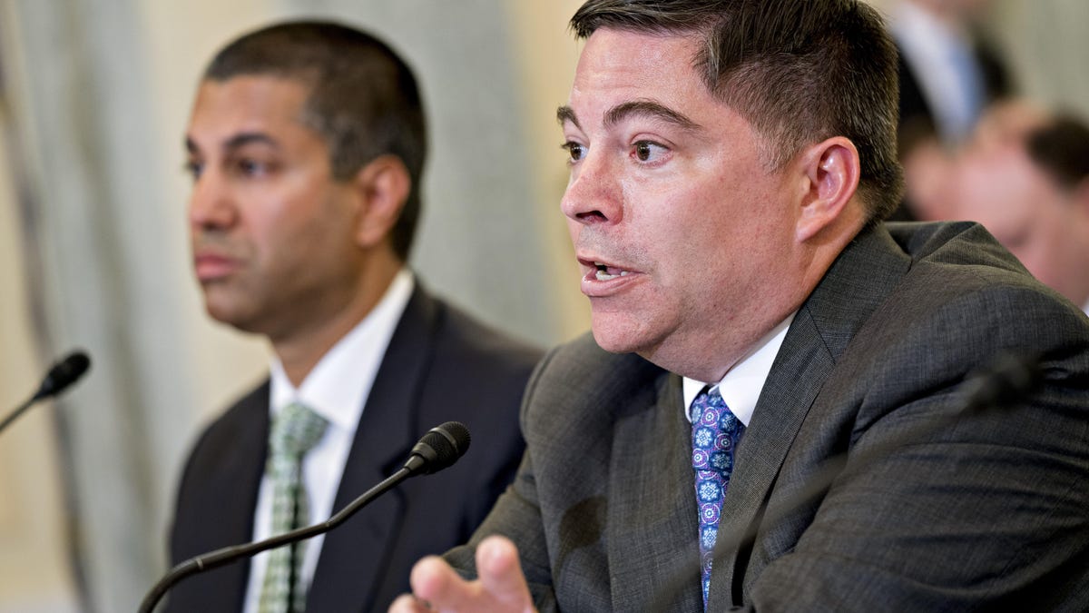 FCC commissioner Michael O'Rielly and Chairman Ajit Pai