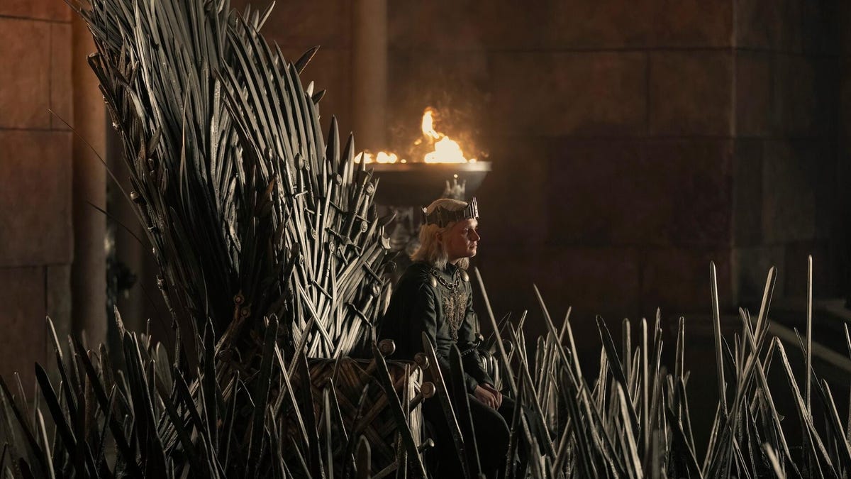 tom glynn carney sits on iron throne in house of the dragon