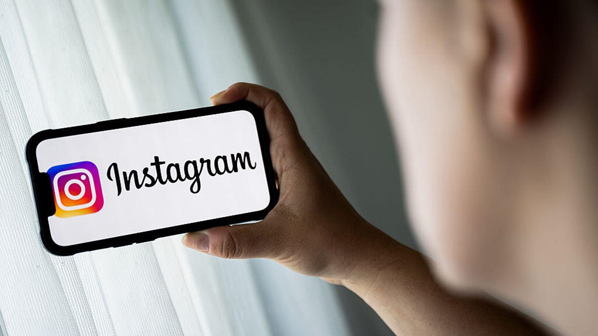 An Instagram logo is shown on a smartphone