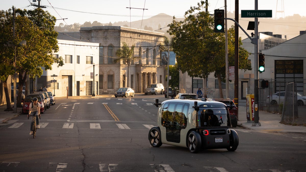 A Zoox robotaxi drives on the streets of San Francisco